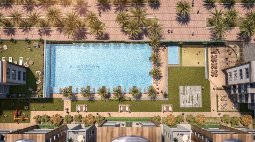 Vue aérienne d&#039;un complexe de luxe doté d&#039;une grande piscine labellisée &quot;Panthéon Elysée&quot;, entourée de palmiers, de chaises longues et de sections de jardins et d&#039;allées bien entretenus.