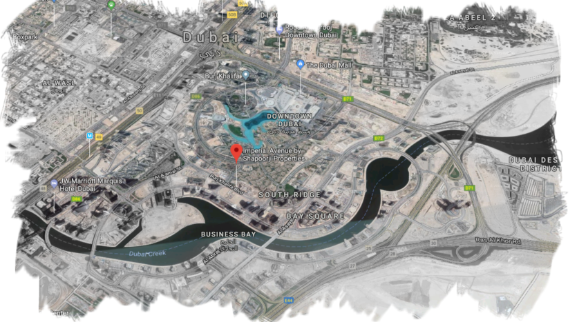 Carte satellite de Dubaï mettant en évidence les zones clés telles que le centre-ville de Dubaï et Business Bay, avec des monuments remarquables, notamment l&#039;Imperial Avenue et le canal de Dubaï, visibles.