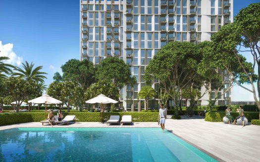 Une vue panoramique sur la piscine d'un hôtel de luxe avec des clients se relaxant sur des chaises longues, entourés d'une verdure luxuriante et le bâtiment moderne Collective 2.0 Dubai Hills en arrière-plan.
