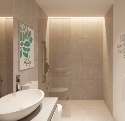 Une salle de bains moderne du Studio One Dubai Marina avec des carreaux beiges, un lavabo ovale, un grand miroir et une décoration murale avec les mots « relax ». Un éclairage doux ajoute une ambiance chaleureuse.