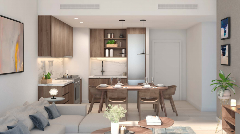Intérieur d&#039;appartement moderne à Dubaï comprenant un aménagement ouvert avec une cuisine présentant un dosseret en marbre blanc et des armoires en bois, un coin repas avec une table ronde et des chaises, et un espace de vie confortable avec un canapé et