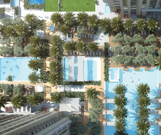 Vue aérienne de la tour Amna dans la ville d&#039;Al Habtoor, comprenant un complexe hôtelier de luxe avec plusieurs piscines, des palmiers luxuriants et des bains de soleil sur les ponts, entourés de hautes