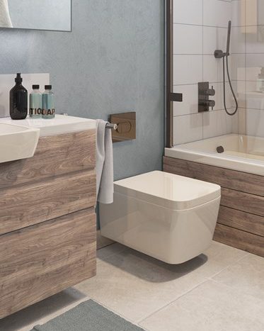 Salle de bains moderne avec meuble-lavabo en bois al jure, toilettes murales blanches et douche à l'italienne avec porte vitrée. Les murs bleu clair et le carrelage gris rehaussent l'esthétique épurée et contemporaine.
