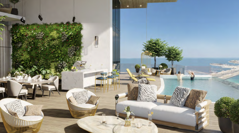 Toit-terrasse luxueux doté d&#039;un mobilier d&#039;extérieur élégant, d&#039;un coin cuisine élégant et d&#039;une piscine à débordement donnant sur une vue côtière dans une villa à Dubaï, complétée par un mur végétal vert vif.