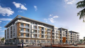 Immeuble d'appartements moderne au design épuré, doté de grandes fenêtres, de balcons et d'un mélange de façades blanches et brunes du Panthéon Elysée 3, sous un ciel bleu clair. Personnes