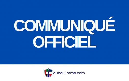 Un graphisme sur fond bleu gras affichant le texte « communiqué officiel » en grosses lettres blanches, avec le logo de Dubai Immo dans le coin inférieur droit.