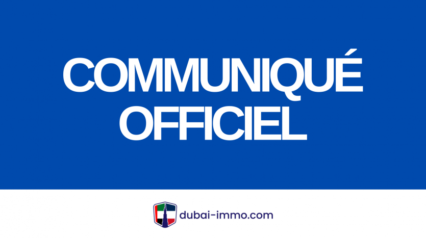 Un graphisme sur fond bleu gras affichant le texte « communiqué officiel » en grosses lettres blanches, avec le logo de Dubai Immo dans le coin inférieur droit.