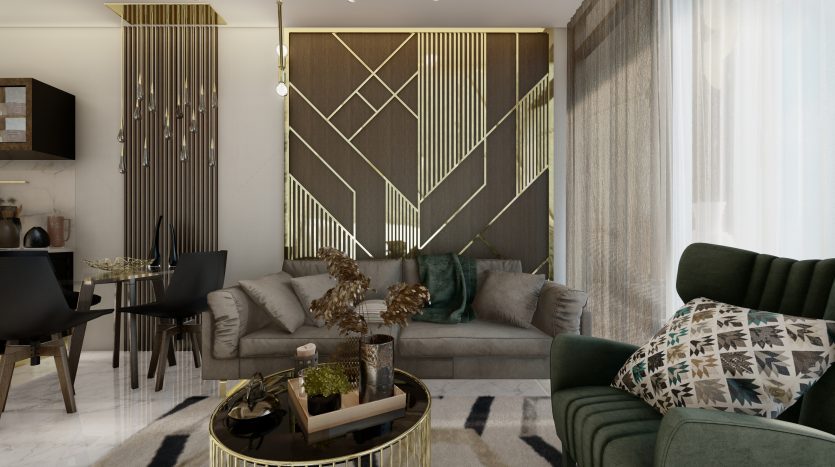 Un salon moderne doté d&#039;un canapé gris adossé à un panneau mural décoratif doré, de chaises vertes moelleuses, d&#039;une table basse circulaire et d&#039;un éclairage subtil dans une propriété de l&#039;immobilier de Dubaï.