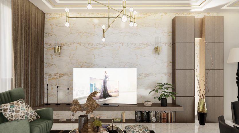 Un salon moderne dans une villa de Dubaï avec des murs en marbre, une grande télévision flanquée de hautes armoires en bois, des suspensions élégantes, un fauteuil vert et diverses plantes et objets décoratifs.