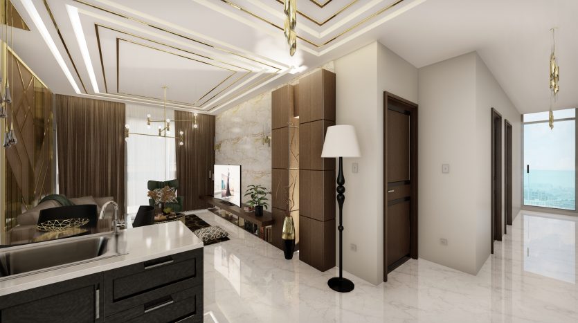 Cuisine moderne luxueuse avec des armoires noires élégantes, des comptoirs en marbre et des accents dorés à Samana Waves Dubai. Les caractéristiques comprennent un lampadaire, des appareils électroménagers intégrés et une grande fenêtre avec une vue panoramique.