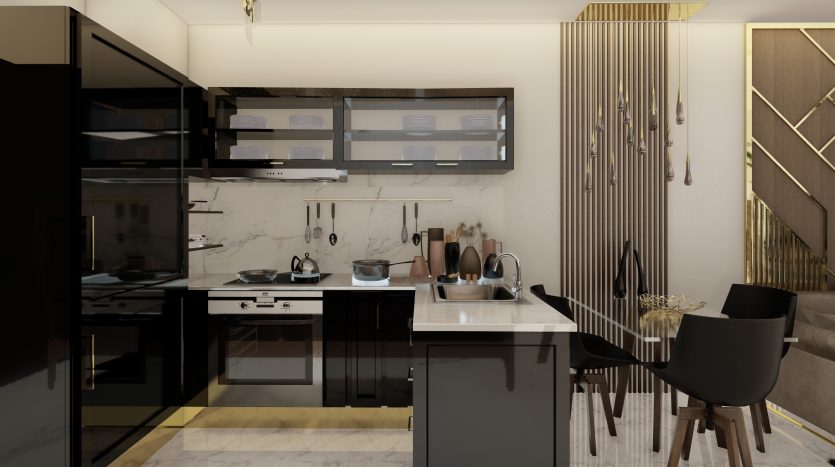 Intérieur de cuisine moderne avec des murs en marbre, des armoires noires et un îlot central avec une cuisinière et un coin repas à Samana Waves Dubai, complété par des éléments décoratifs élégants.