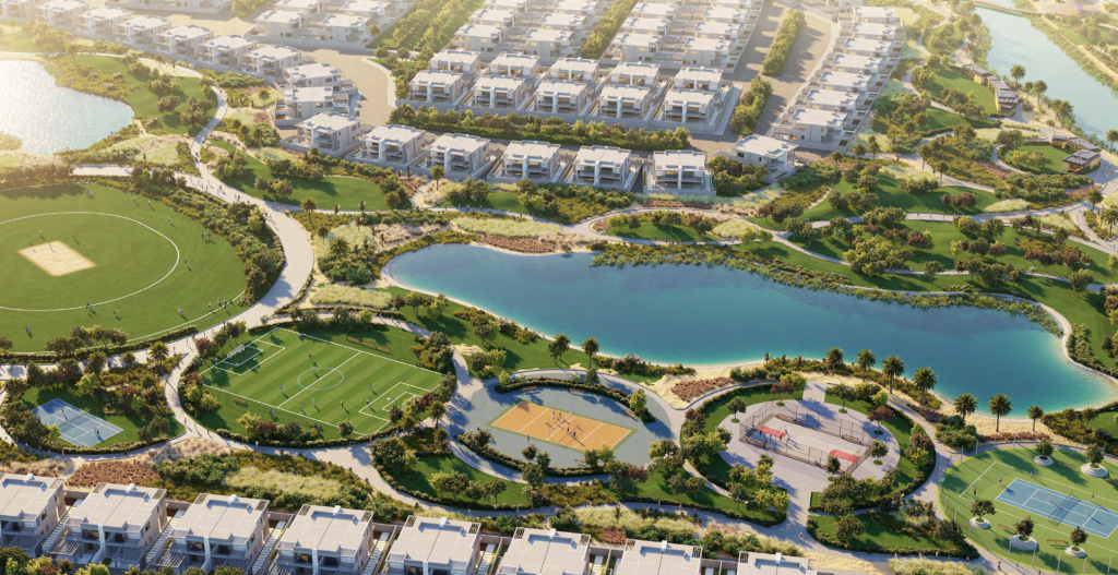 Vue aérienne d'un quartier résidentiel luxueux de Dubaï avec des maisons parfaitement alignées, des espaces verts luxuriants, un grand lac central, des courts de tennis et un parcours de golf, présentant un agencement suburbain parfait.