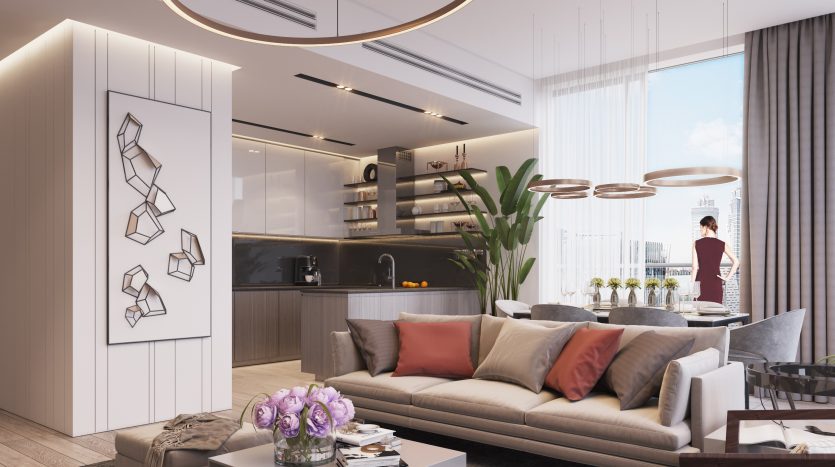 Un salon décloisonné moderne dans un appartement de Dubaï relié à une cuisine, doté de meubles contemporains, de suspensions élégantes et d&#039;œuvres d&#039;art décoratives, avec vue sur un paysage urbain.
