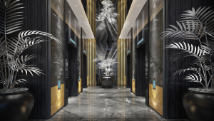 Hall d'entrée luxueux avec une palette de couleurs sombres, avec de grandes plantes décoratives et un éclairage artistique. Une sculpture blanche saisissante centrée entre des murs en miroir renforce l'atmosphère opulente de cet appartement de premier ordre à Dubaï