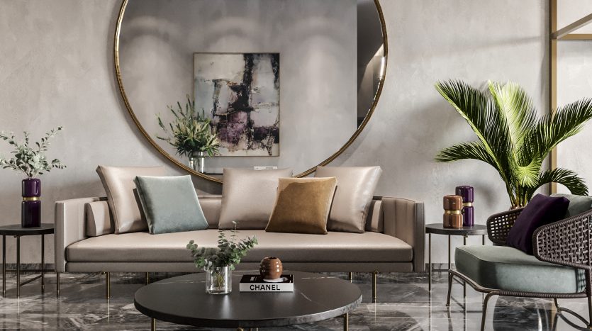 Un salon luxueux dans une villa à Dubaï avec un canapé beige, une table basse ronde moderne, un grand miroir circulaire, des œuvres d&#039;art murales abstraites et des plantes décoratives, mettant en valeur un sol en marbre élégant et une élégance discrète