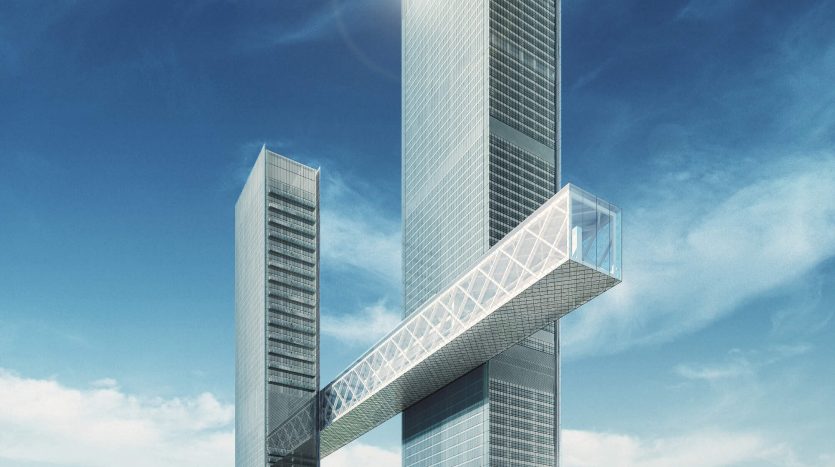 Un rendu architectural futuriste de gratte-ciel jumeaux reliés par un pont horizontal, sur un ciel bleu vif avec de légers nuages et une verdure luxuriante à la base, idéal pour investir à Dubaï.