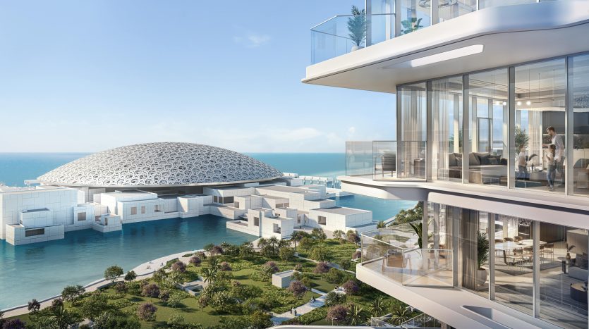 Architecture côtière futuriste comprenant une villa au motif géométrique et des bâtiments modernes dotés de grandes fenêtres en verre donnant sur la mer à Dubaï, entourés d&#039;un aménagement paysager verdoyant.