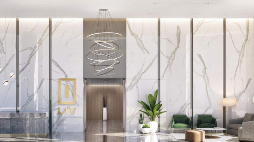 Intérieur luxueux du hall d&#039;entrée d&#039;un appartement de Dubaï avec des murs en marbre aux motifs veinés, un lustre moderne, des meubles élégants et des plantes d&#039;intérieur, complétés par un éclairage ambiant chaleureux.