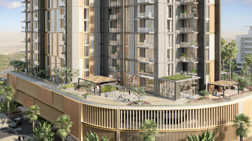 Un immeuble avec balcon et arbres, idéal pour investir dans l'immobilier à Dubaï.