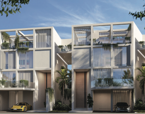 Façade d'un immeuble résidentiel moderne à Dubaï avec deux unités symétriques, chacune dotée de balcons avec jardins verticaux et lattes de bois élégantes, sous un ciel dégagé. Une voiture jaune et une voiture noire sont garées