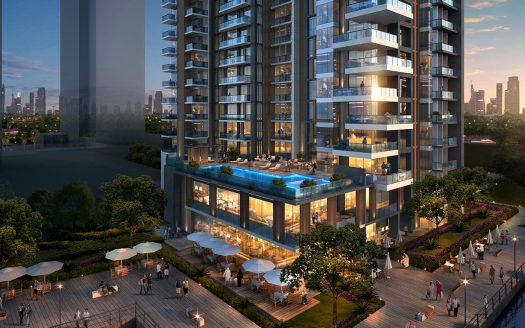 Immeuble d&#039;appartements moderne de grande hauteur doté d&#039;une terrasse spacieuse dotée d&#039;une piscine et de sièges extérieurs, entouré d&#039;une verdure luxuriante au crépuscule, avec les toits de la ville de Dubaï en arrière-plan. Idéal pour ceux qui cherchent à investir