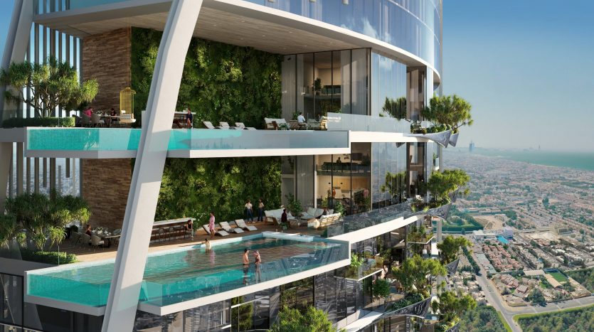 Luxueux immeuble d&#039;appartements de grande hauteur à Dubaï doté de balcons avec piscines à débordement, d&#039;une verdure luxuriante et d&#039;une vue panoramique sur la ville. Les résidents profitent d’activités de loisirs dans des espaces extérieurs modernes et spacieux.