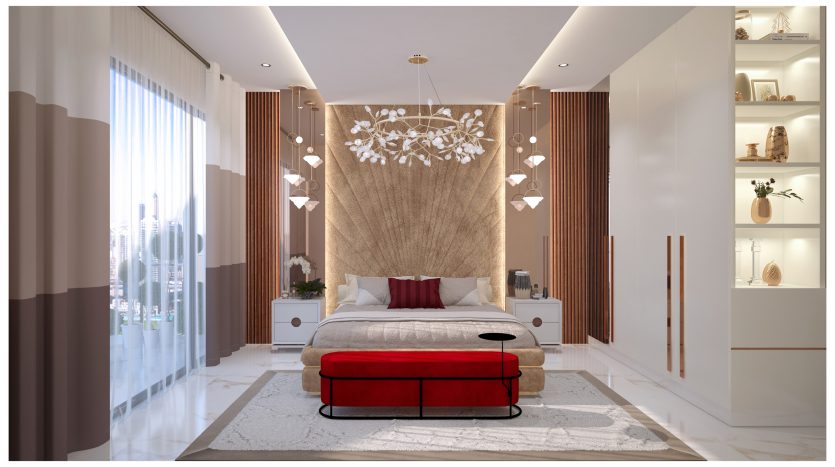 Une chambre moderne et luxueuse dans une villa à Dubaï avec un grand lit doté d&#039;une tête de lit aux tons terre, d&#039;un pouf rouge, d&#039;un plafonnier complexe, flanqué de rideaux transparents et opaques et de blanc