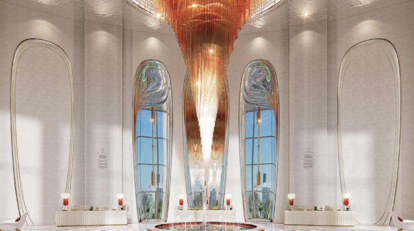 Un hall d&#039;hôtel luxueux à Dubaï doté d&#039;un élégant grand lustre orange qui tombe en cascade d&#039;un haut plafond, entouré de sols en marbre, de grands panneaux de verre artistiques et d&#039;un mobilier moderne.