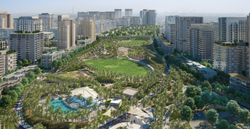 Vue aérienne d&#039;un parc urbain moderne entouré d&#039;immeubles résidentiels de grande hauteur, comprenant des espaces verts luxuriants, des sentiers pédestres, une grande pelouse centrale et un parc aquatique à proximité d&#039;un appartement de Dubaï.