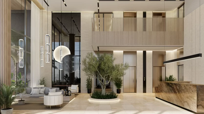 Hall d&#039;entrée moderne avec de hauts plafonds, doté d&#039;un balcon, d&#039;un mobilier élégant assorti, de grandes jardinières avec des arbres et un mélange de matériaux en pierre naturelle et en bois, idéal pour investir à Dubaï.