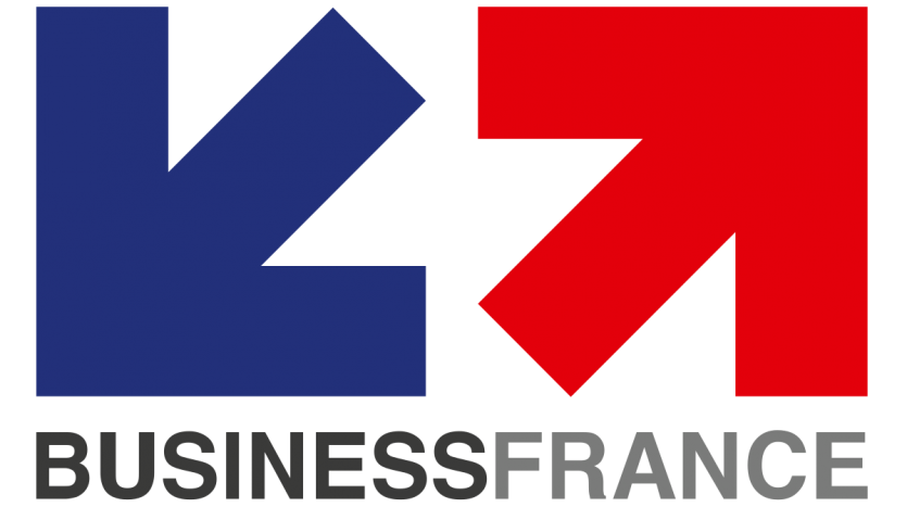 Cette image montre le logo de Business France, composé des lettres stylisées bleues et rouges « K » et « M » ainsi que du nom « BusinessFrance » en lettres majuscules, le tout sur un fond blanc.