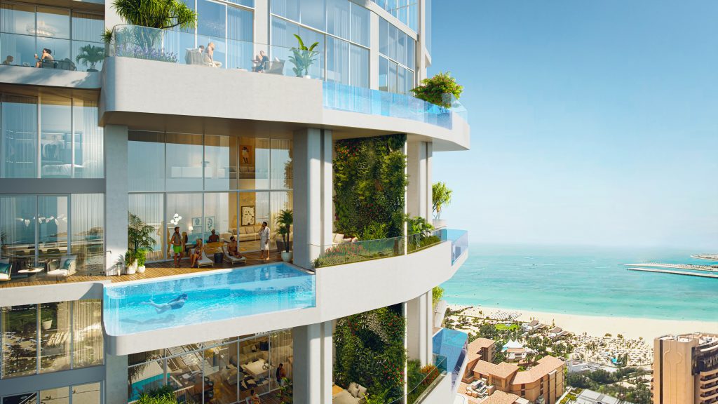 Ein luxuriöses Hochhaus mit modernen Wohnungen mit großen Balkonen, Glasbalustraden und üppigem Grün. Jeder Balkon hat einen eigenen Pool mit Blick auf einen malerischen Strand, perfekt für diejenigen, die eine außergewöhnliche Wohnung suchen.