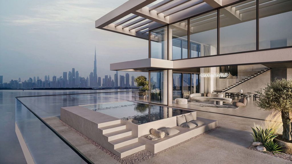 Une luxueuse maison moderne à Dubaï dotée de vastes murs de verre et d'une élégante piscine à débordement surplombant les toits de la ville. Des sièges extérieurs élégants complètent l'architecture contemporaine.