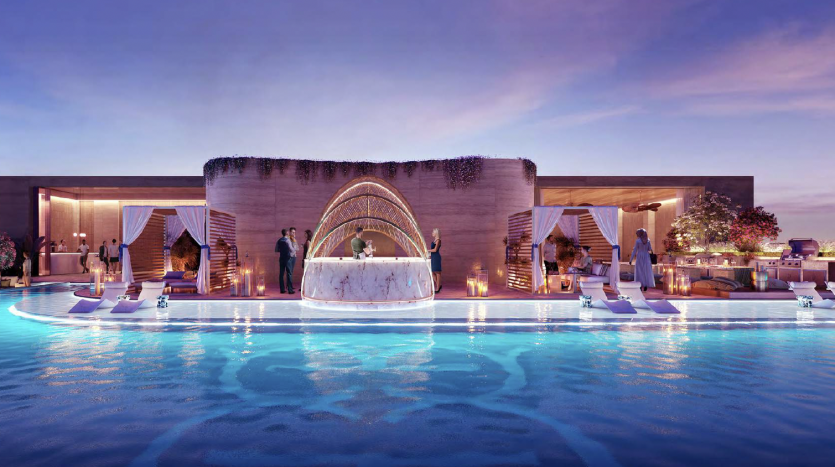 Luxueuse réception de mariage en plein air au crépuscule avec un bar circulaire lumineux au centre d&#039;une piscine, entouré d&#039;invités, d&#039;élégantes compositions florales et un éclairage tamisé dans un cadre immobilier exclusif de Dubaï.