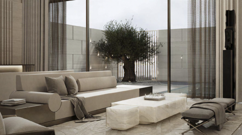 Un salon moderne dans un appartement de Dubaï avec de grandes fenêtres, un canapé aux tons neutres, une table basse en marbre et une décoration minimaliste. Un petit olivier ajoute une touche de nature.