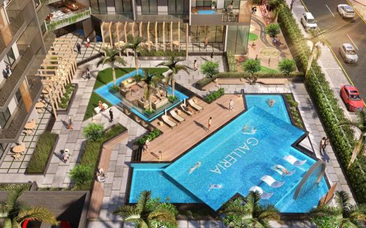 Vue aérienne d&#039;une piscine luxueuse dans un hôtel moderne avec des gens qui se détendent, entourés de chaises longues élégantes, de cabanes et d&#039;une verdure vibrante. Rue adjacente avec des voitures passant à Dubaï