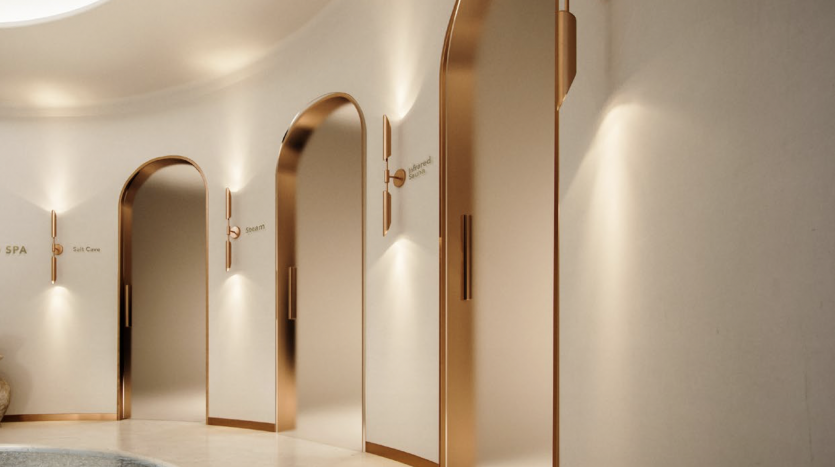 Intérieur de spa moderne avec des murs blancs incurvés, un éclairage subtil et d&#039;élégants accents en bois. Des panneaux directionnels pour les salles de spa sur les murs améliorent l&#039;atmosphère propre et apaisante, idéale pour un immeuble d&#039;investissement à Dubaï.