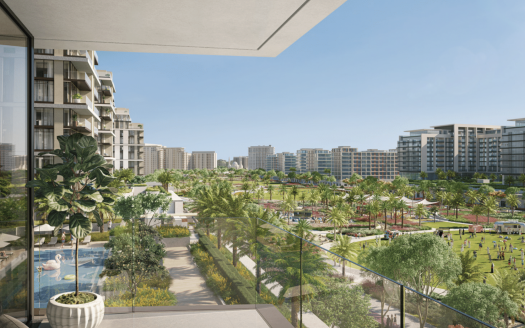 Vue depuis un balcon en hauteur donnant sur un quartier résidentiel luxuriant avec des immeubles d&#039;appartements modernes à Dubaï, des parcs verdoyants et des gens profitant du plein air.