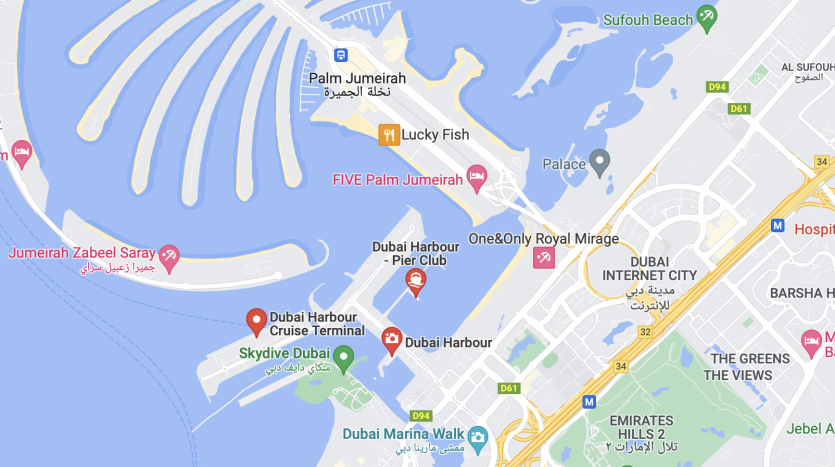 Carte montrant une partie de Dubaï, y compris des monuments tels que Five Palm Jumeirah, Jumeirah Zabeel Saray, Dubai Marina Walk et le port de Dubaï avec les routes et voies navigables environnantes