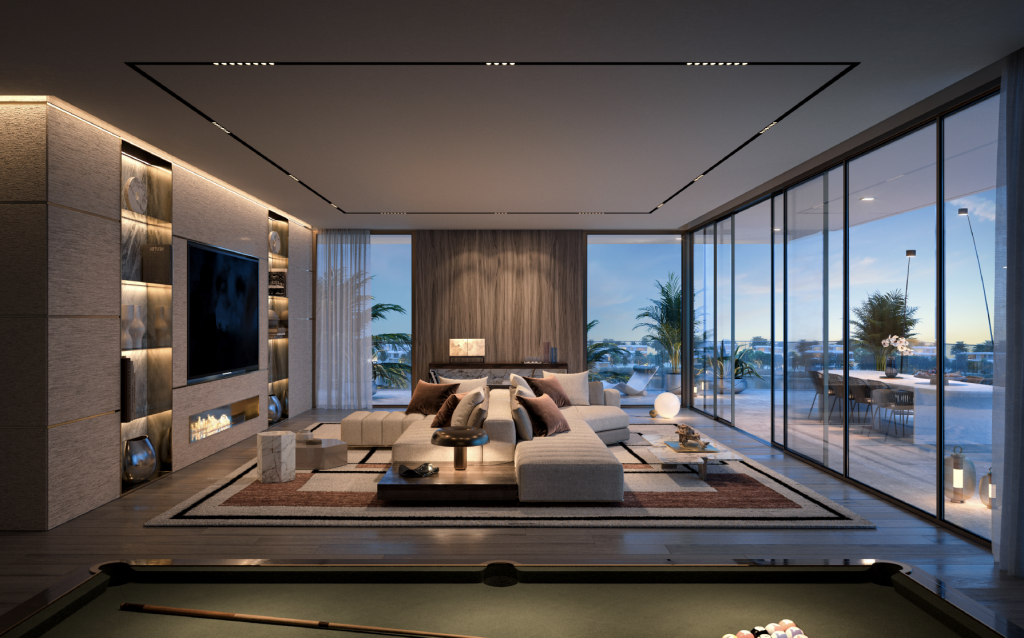 Salon moderne et luxueux au crépuscule avec canapé sectionnel, table de billard, grandes fenêtres donnant sur les toits de la ville de Dubaï et éclairage ambiant chaleureux.