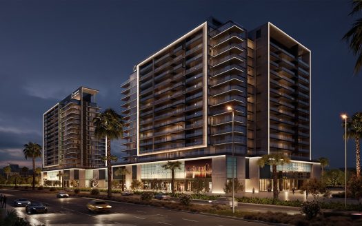 Vue nocturne d&#039;un complexe hôtelier moderne à plusieurs étages avec des balcons éclairés, entouré de palmiers et de voitures passant dans la rue : idéal pour investir à Dubaï.