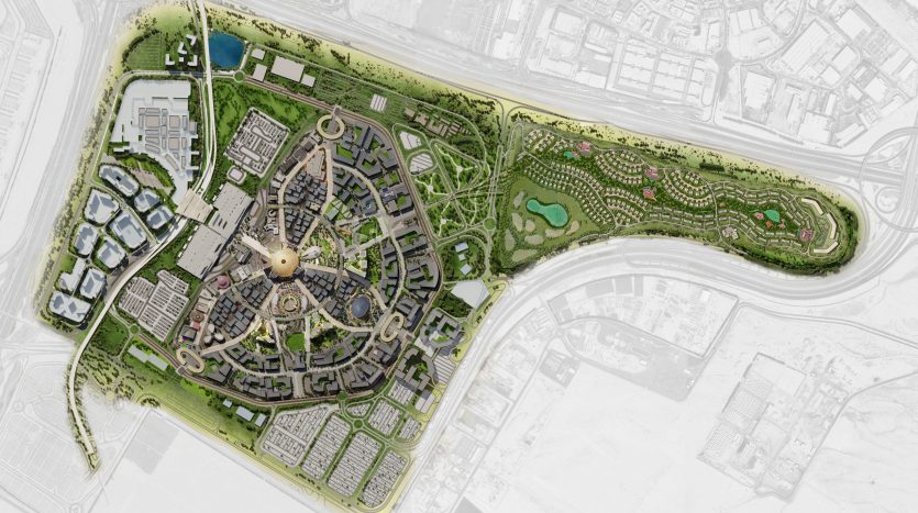 Vue aérienne d'un développement urbain planifié avec une disposition circulaire centrale entourée d'espaces verts luxuriants et de plans d'eau, adjacent aux infrastructures urbaines existantes de Dubaï.