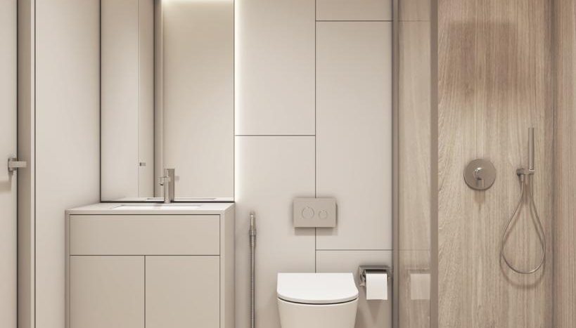 Intérieur de salle de bains moderne dans une villa de Dubaï avec murs en bois et blancs, comprenant une cabine de douche, des toilettes, un lavabo et un miroir lumineux.