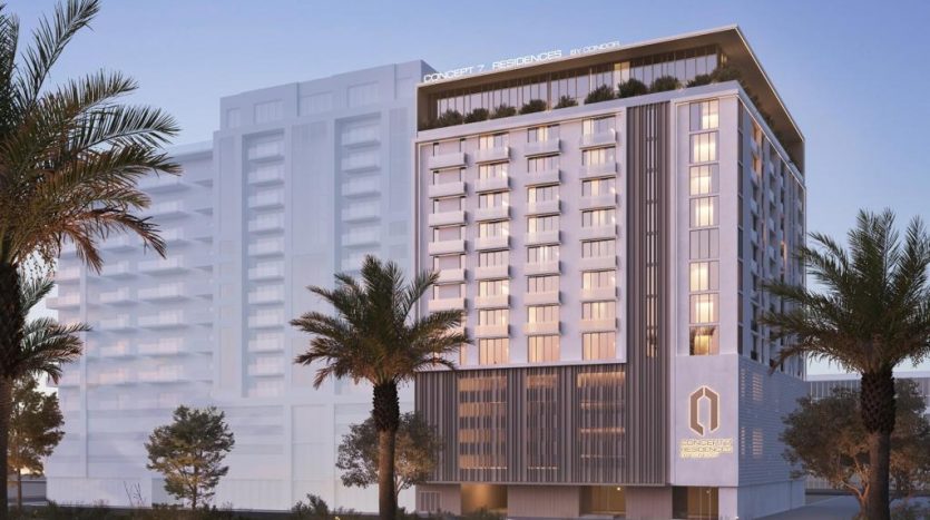 Rendu 3D d&#039;un hôtel moderne au crépuscule à Dubaï, avec des extérieurs éclairés, un logo bien visible sur la façade, des palmiers et une entrée paysagée.