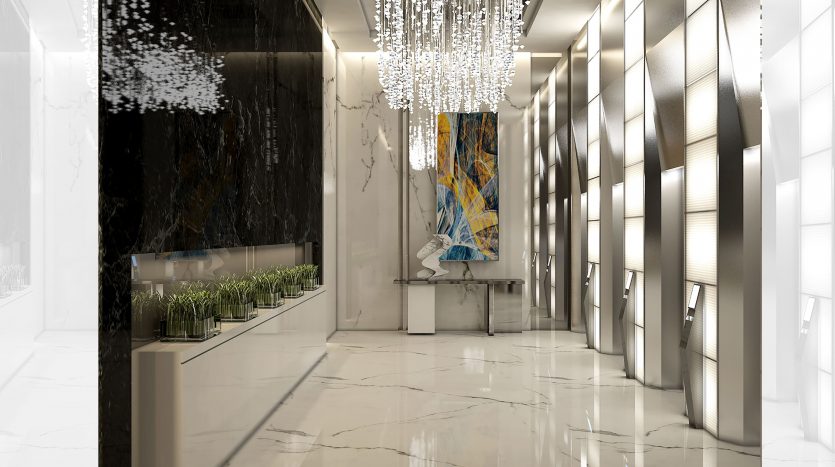 Intérieur luxueux et moderne du hall d&#039;un appartement de Dubaï avec des sols en marbre réfléchissant, des panneaux muraux artistiques, une grande peinture abstraite colorée et un lustre orné suspendu au-dessus.