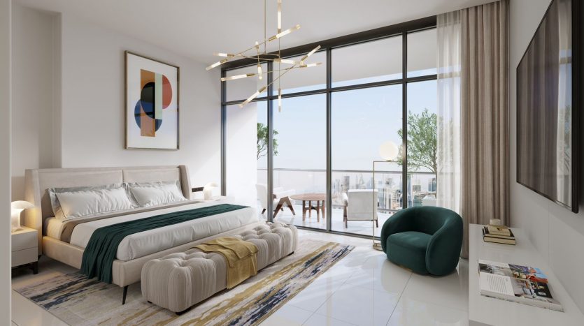 Chambre moderne dans un appartement de Dubaï comprenant un grand lit avec une literie blanche et bleu sarcelle, un fauteuil vert moelleux et de grandes fenêtres donnant sur un balcon et une vue lointaine. Ambiance lumineuse et aérée rehaussée par des éléments élégants,