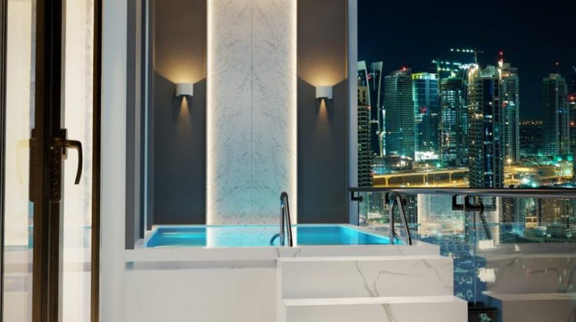 Salle de bains luxueuse dans une villa de Dubaï, dotée d'une grande baignoire éclairée et de marches en marbre avec cascade et vue panoramique sur les toits de la ville la nuit.