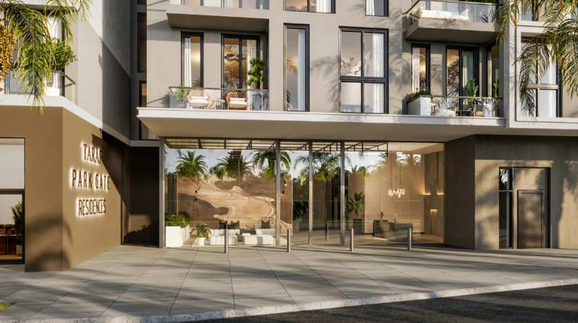 Immeuble d&#039;appartements de luxe moderne avec portes vitrées, entouré de palmiers, arborant une pancarte &quot;Villa Dubai Residence&quot;. La lumière du soleil projette des ombres sur la façade.