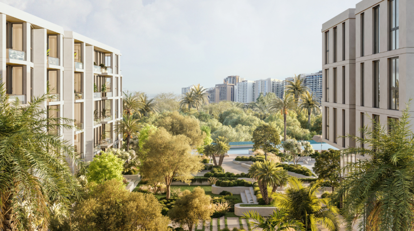 Parc verdoyant entouré de bâtiments modernes à plusieurs étages avec des jardins paysagers, des palmiers, des allées et une piscine dans un cadre suburbain ensoleillé de Dubaï.