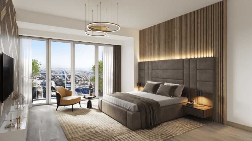 Chambre d&#039;appartement moderne à Dubaï comprenant un grand lit, une tête de lit rembourrée, des baies vitrées mettant en valeur le paysage urbain, du parquet et un coin salon confortable. La lumière naturelle illumine la pièce